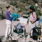 A volunteer having discussion with student