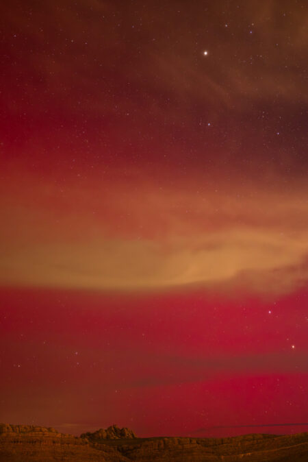 An brilliant red aurora visible in southwest Utah on November 11, 2025.