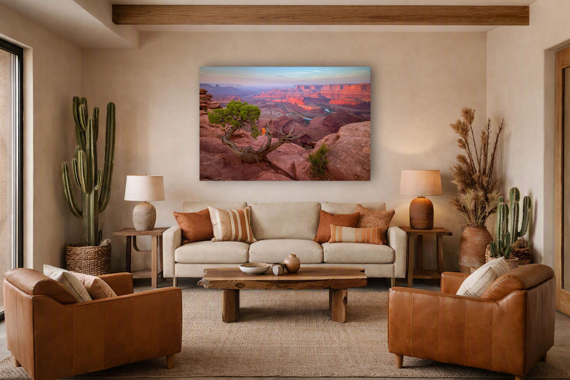 A wall display of the print "Dead Horse Sunrise" in a warm desert themed room.
