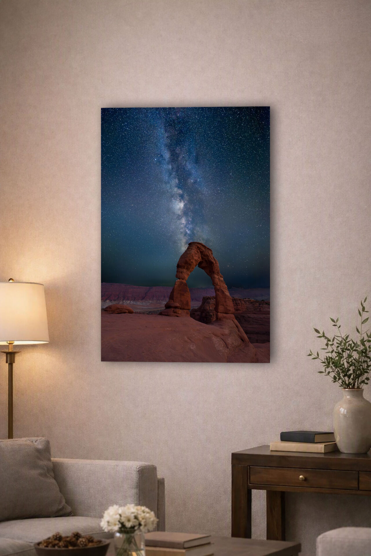 A wall display in a living room of the print "Night at Delicate Arch."