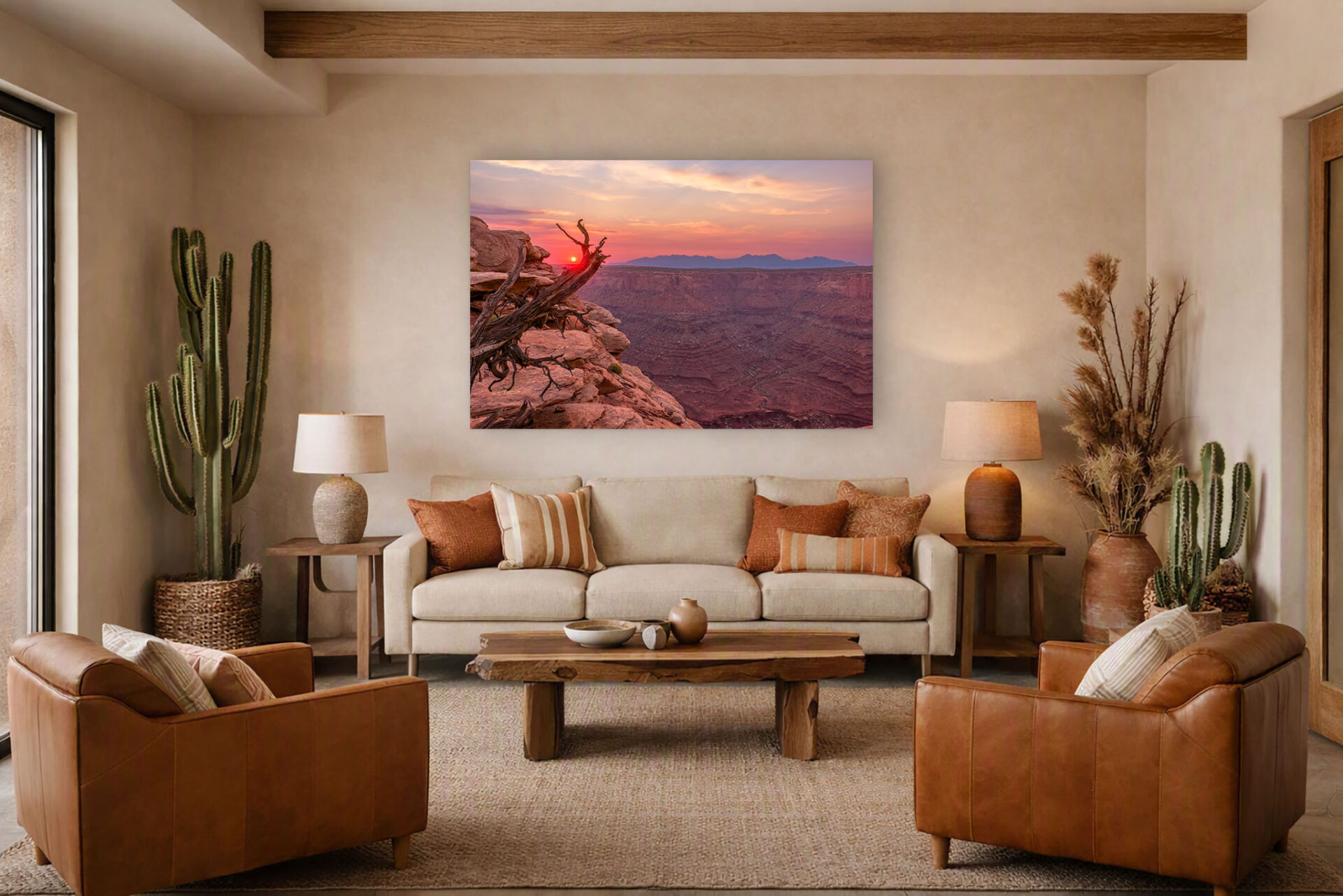 A wall display of the print "Red Dawn Over the La Sals" in a warm desert themed room.